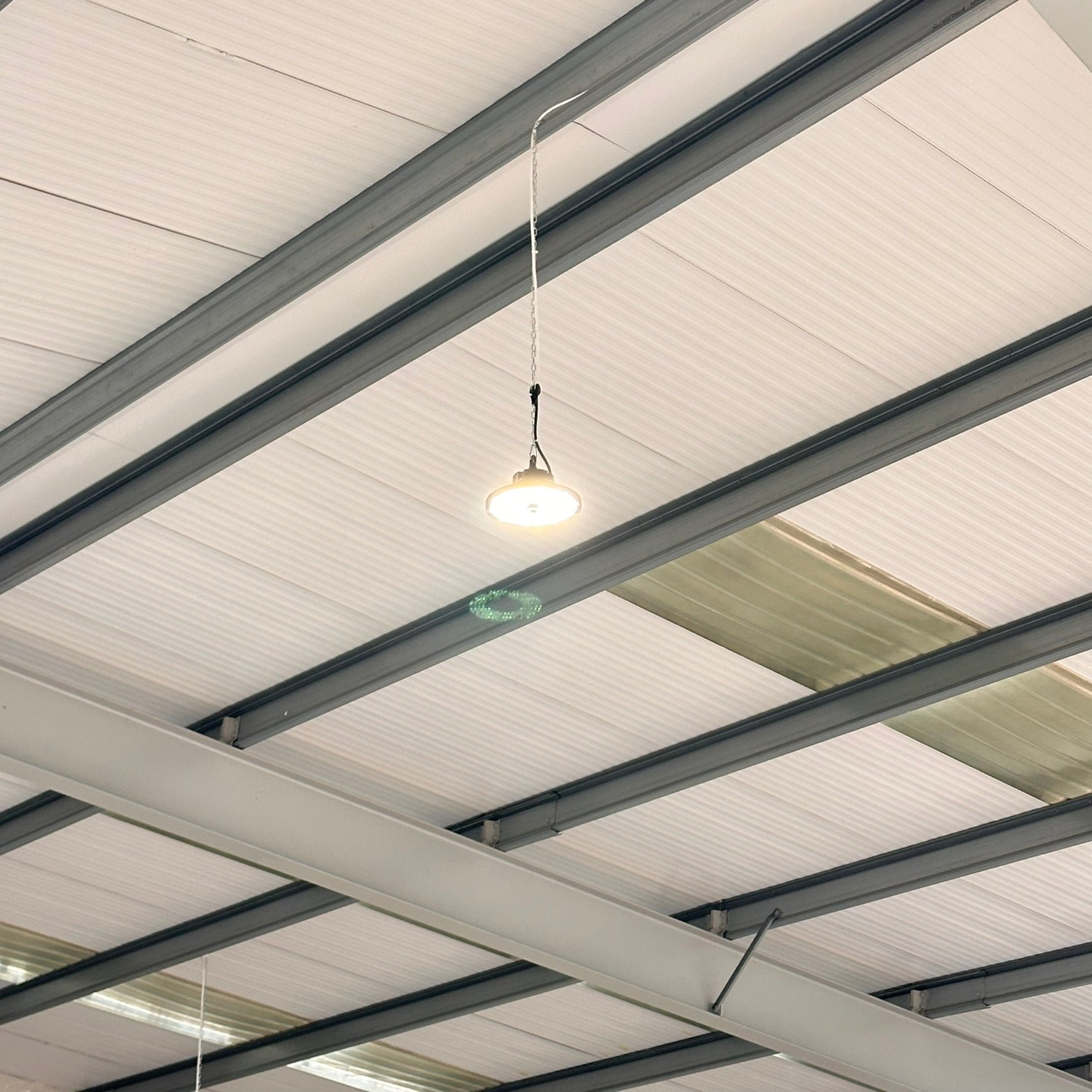 Paragon high bay light installed in an industrial warehouse ceiling